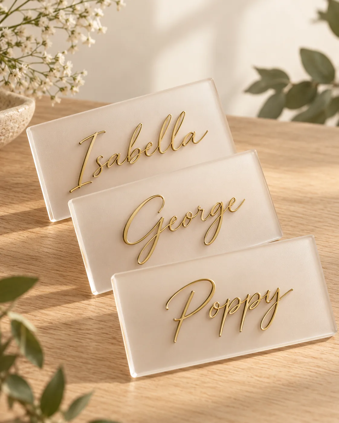 Frosted acrylic place names with gold script