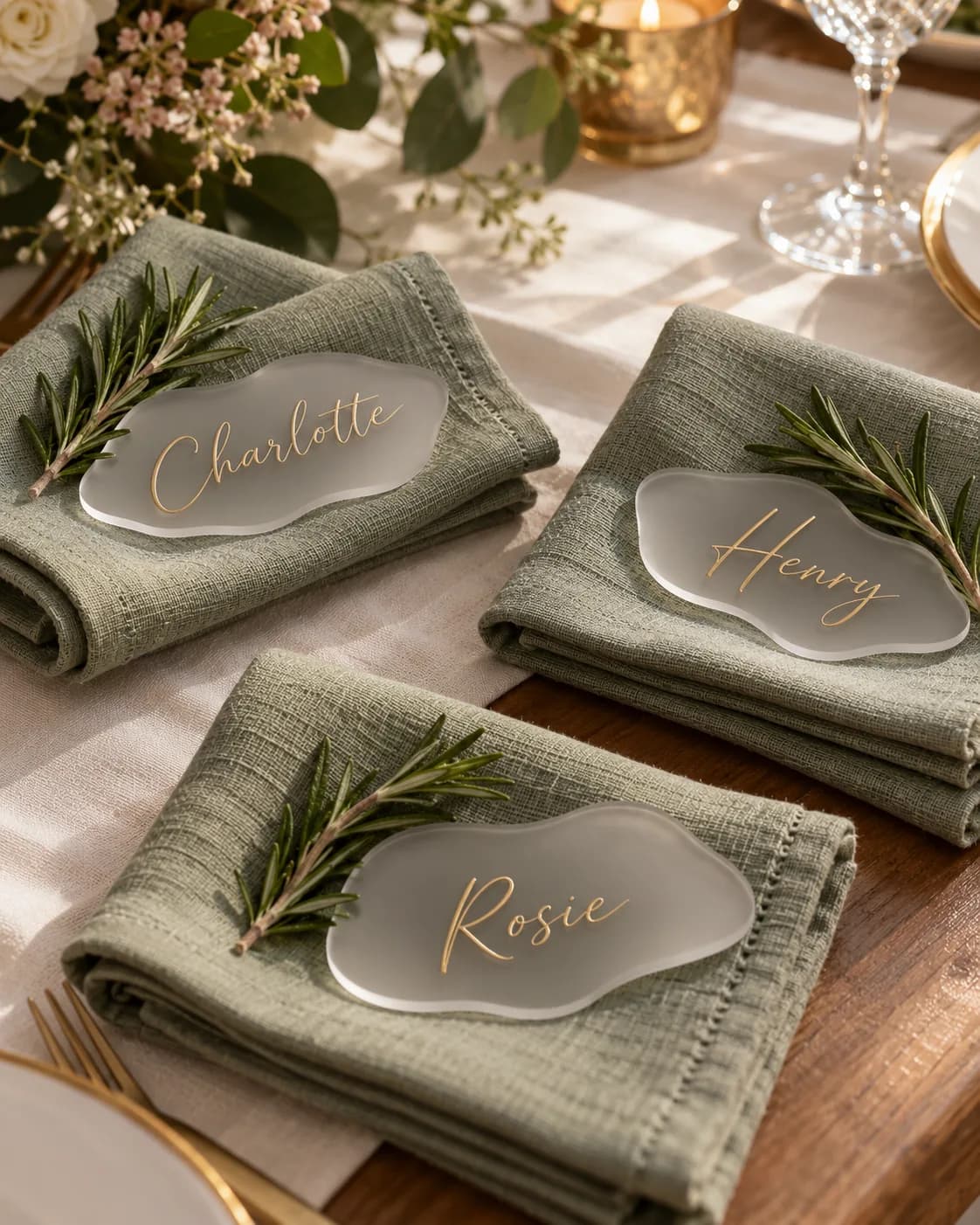 Frosted place names on sage napkins